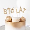 swieczka-na-tort-zloty-napis-sto-lat